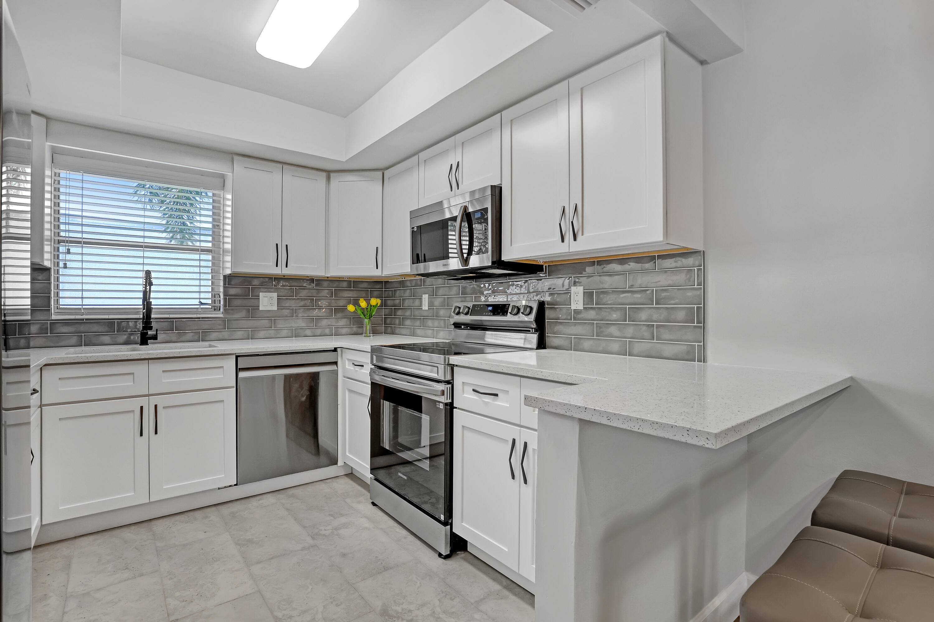 Experience a brand new kitchen, bathroom, and flooring, all complemented by fresh paint.