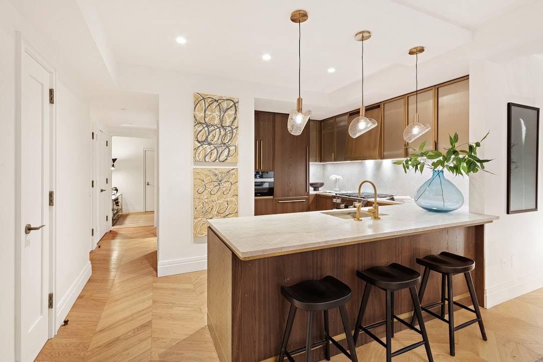 Residence 6F is a stunning one bedroom, one and a half bathroom featuring a generous foyer and expansive living dining room.