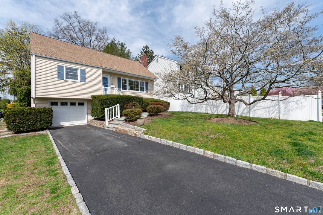 A wonderful 4 bedroom Cape Cod Style home in the Newfield section of Stamford.