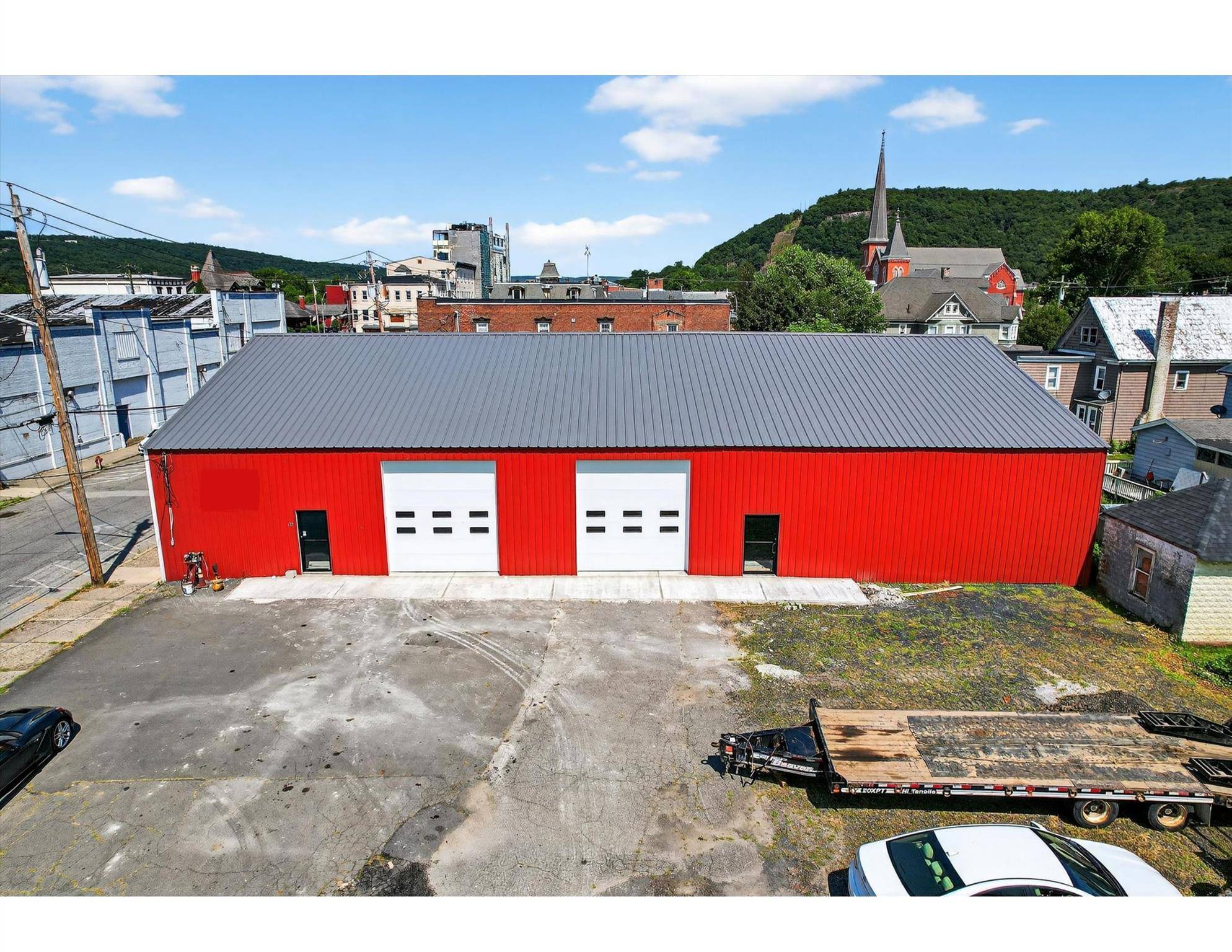 This building and property includes 4 lots 98, 104, 106, 110 totaling 23, 500 sq ft.