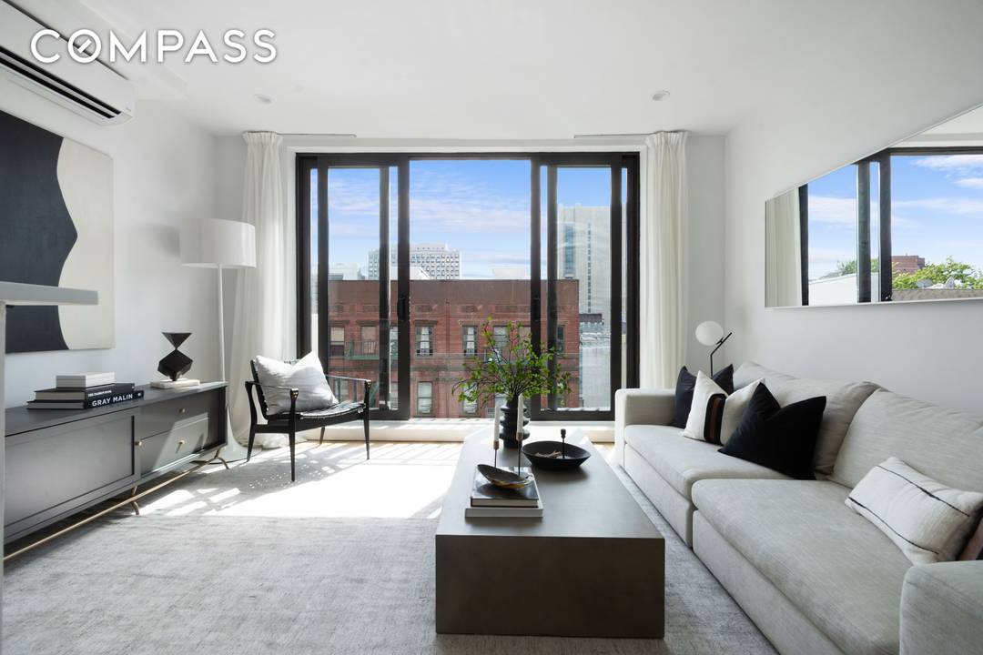 Step into The Sandstone, a dazzling brownstone condo building where history meets luxury.