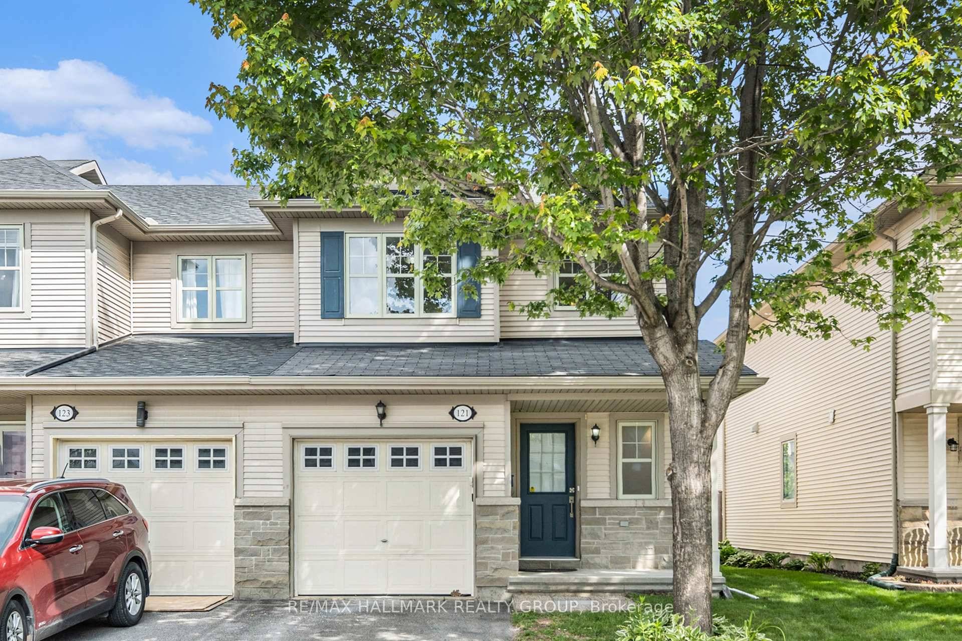 Bright and spacious open concept 3 bedroom, 4 bath end unit townhouse with a rear deck fully fences yard.