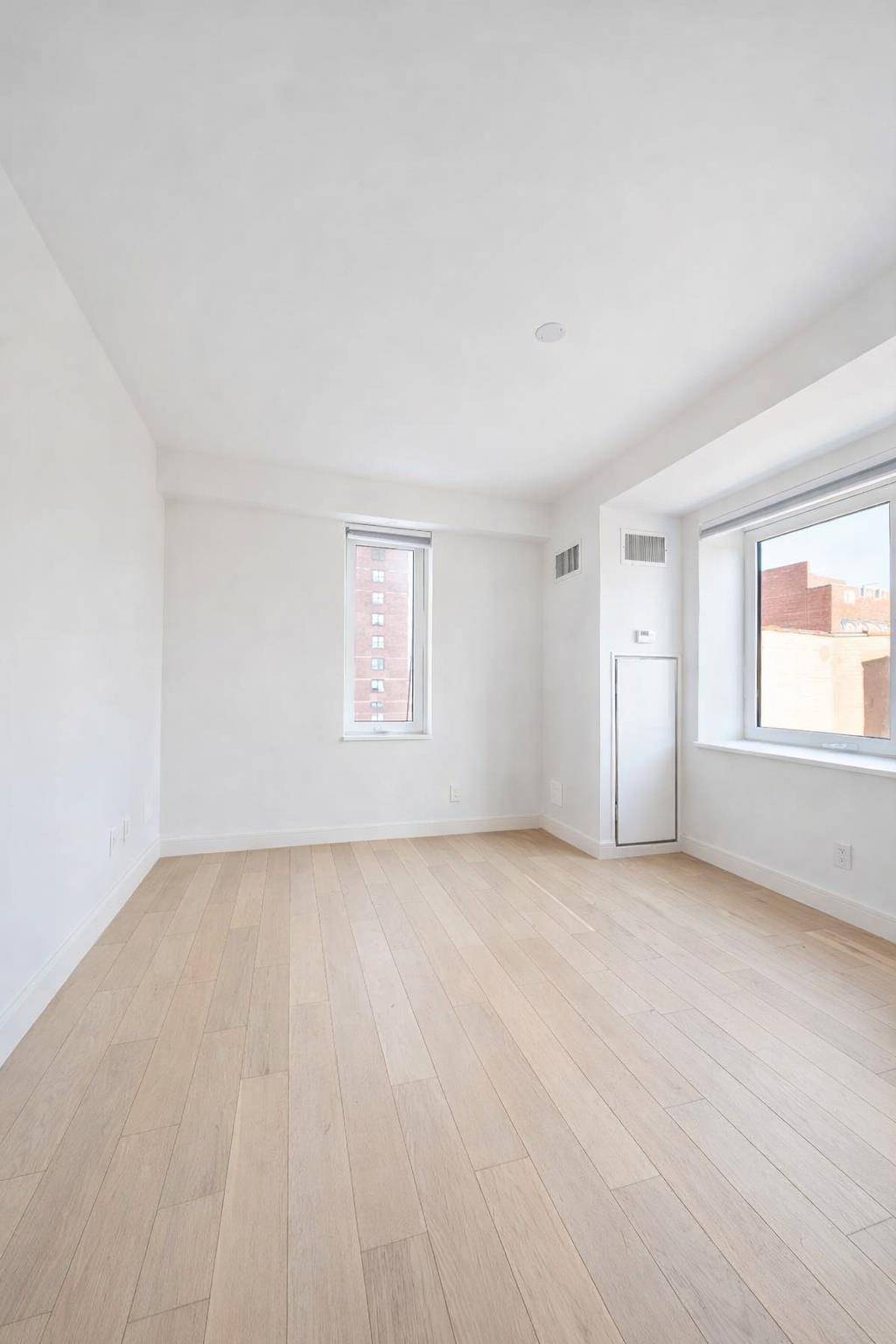 This spacious studio residence offers a corner living area with floor to ceiling sound attenuated windows which face North and East.