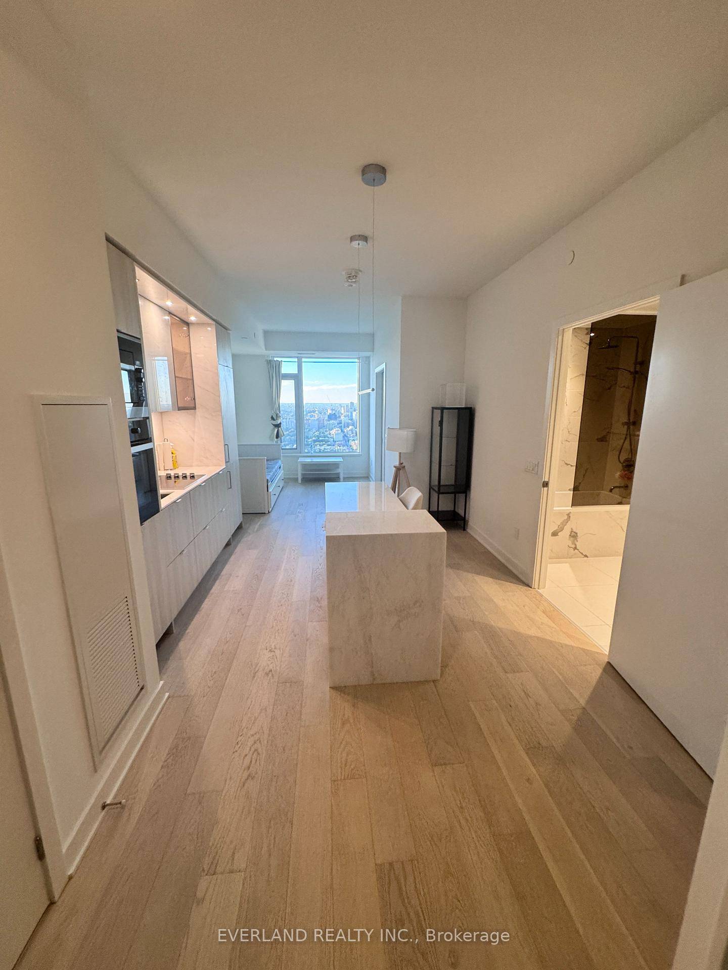 Experience elevated living in the heart of Yorkville with this stunning 1 bedroom den suite perched high on the 48th floor.
