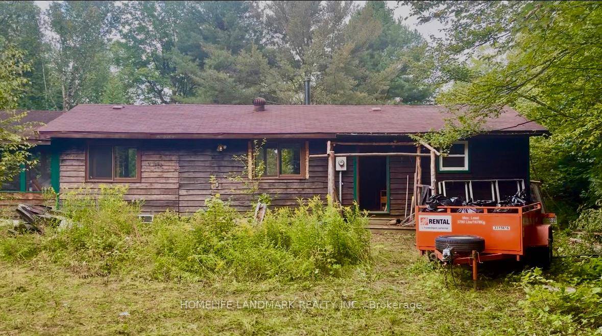 A rare opportunity to own a private waterfront retreat with endless potential.