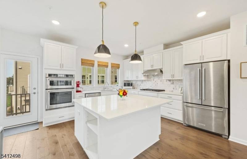 Luxury end unit townhome for rent in the desirable community with south east 3 sides of windows.