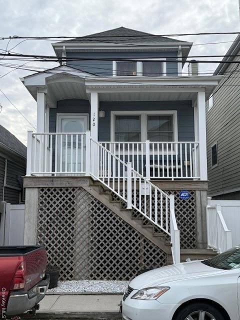 Just bring your furniture to this beautifully maintained, newly built 2017 raised home in the heart of Broad Channel.