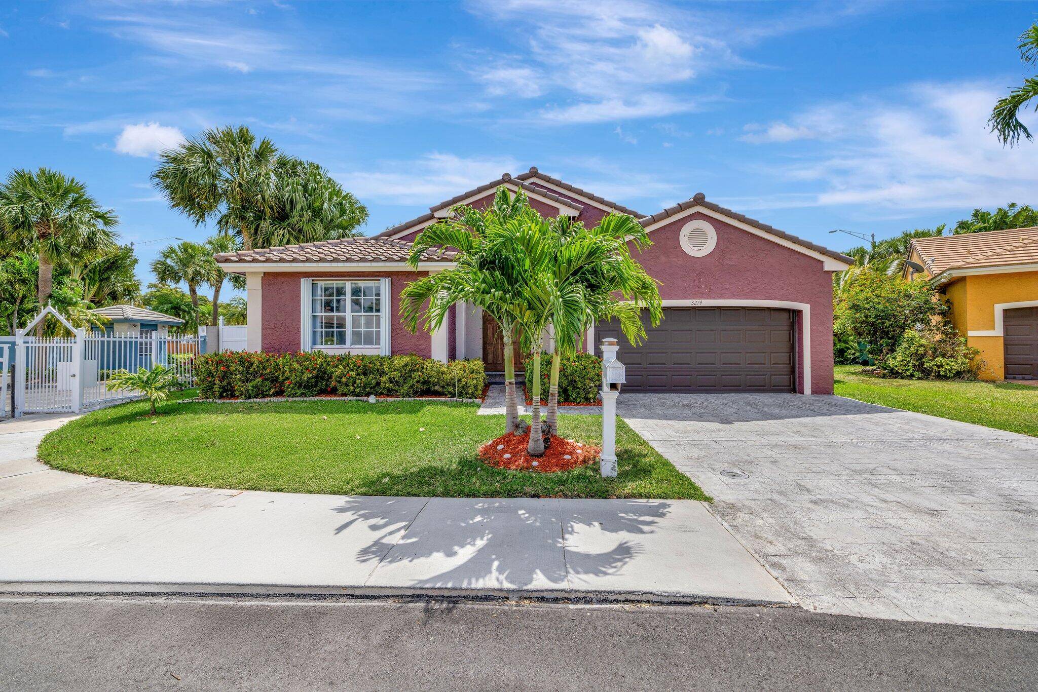 Beautiful 3 2 retreat in an exclusive Oakland Park community !