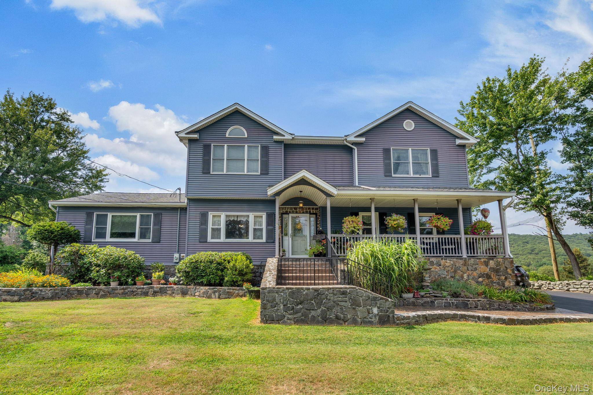 Come see this beautifully cared for home w lushly landscaped outdoor retreat, featuring an inground pool, stunning stonework, flower beds, gazebo and Koi pond.