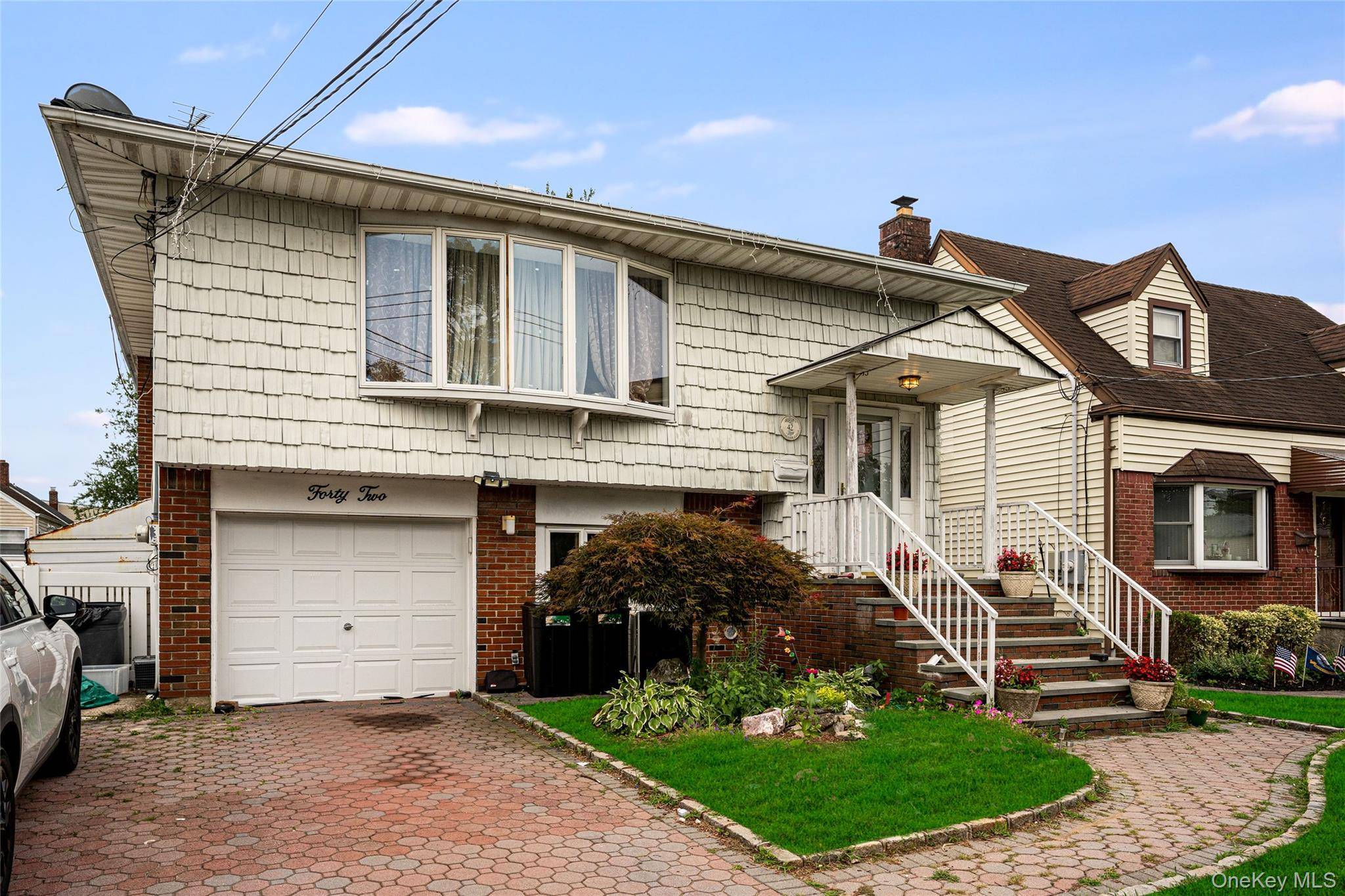 This beautifully maintained Hi Ranch offers spacious living across two levels, featuring 5 bedrooms and 3 full bathrooms, perfect for living and entertaining.