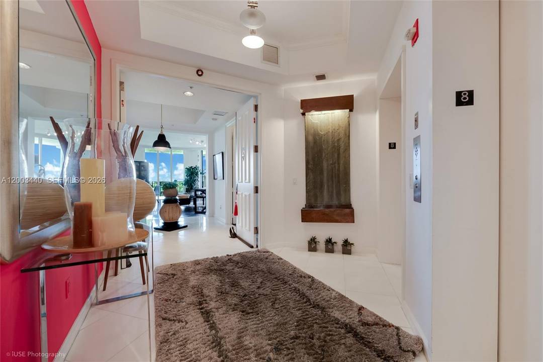 Experience elevated living in exclusive guard gated community of Deering Bay.