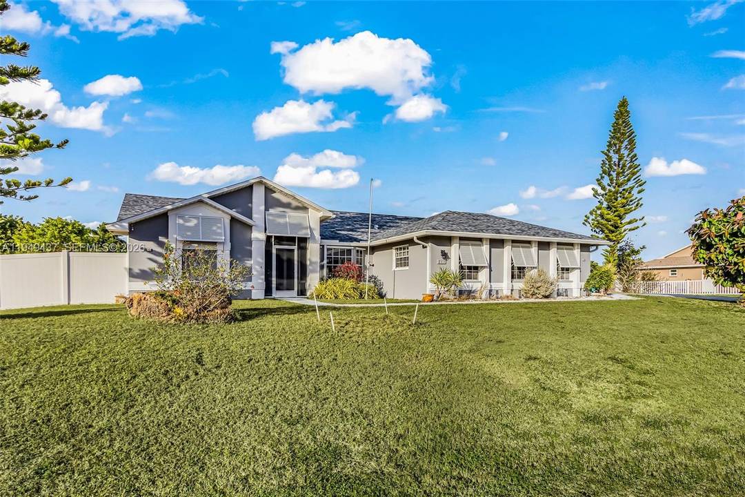 Prime SW Cape Coral Remodeled Pool Home on an Rare 4 Lot site Nearly Half an Acre !