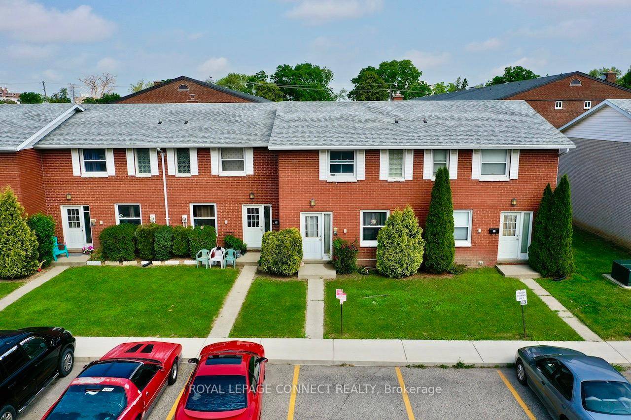 All brick centrally located well established 2 storey, 3 bedroom, 2 washroom condominium townhome with own exclusive parking, and sizeable useable unfinished basement, laundry area, and gas forced air heating.