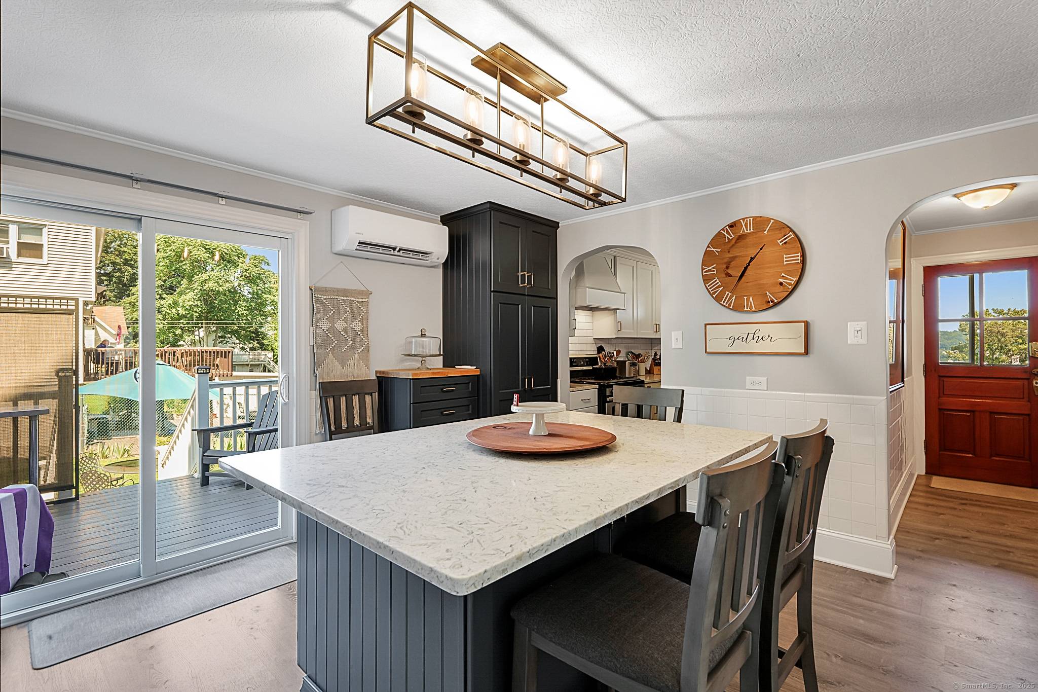 Spoil yourself in this gorgeously remodeled 2 family home with all the bells and whistles for the main floor !