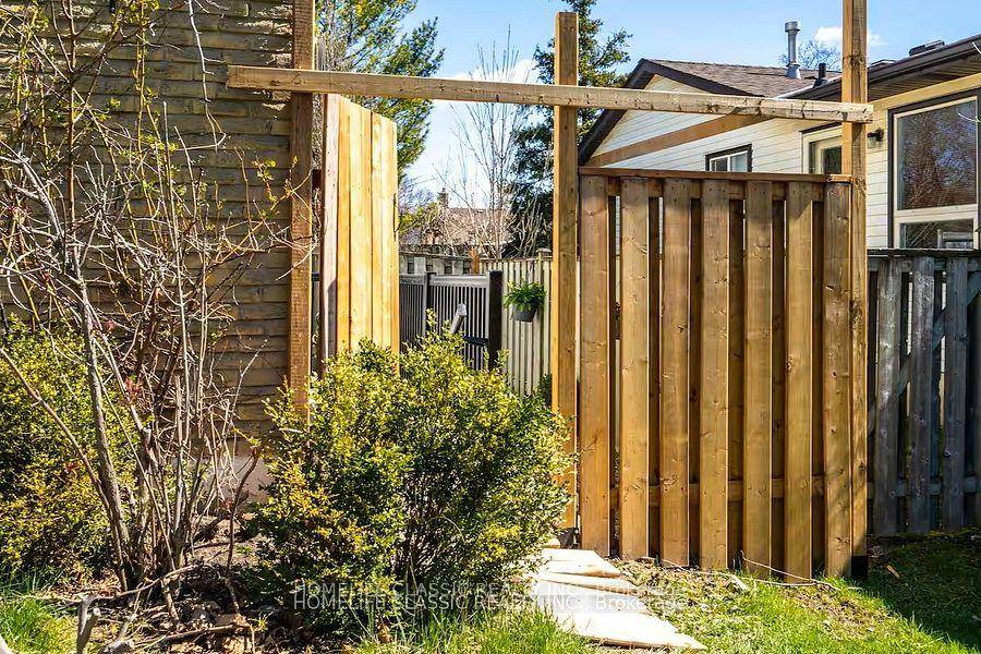 WALK UP Entrance with PRIVATE SIDE YARD !