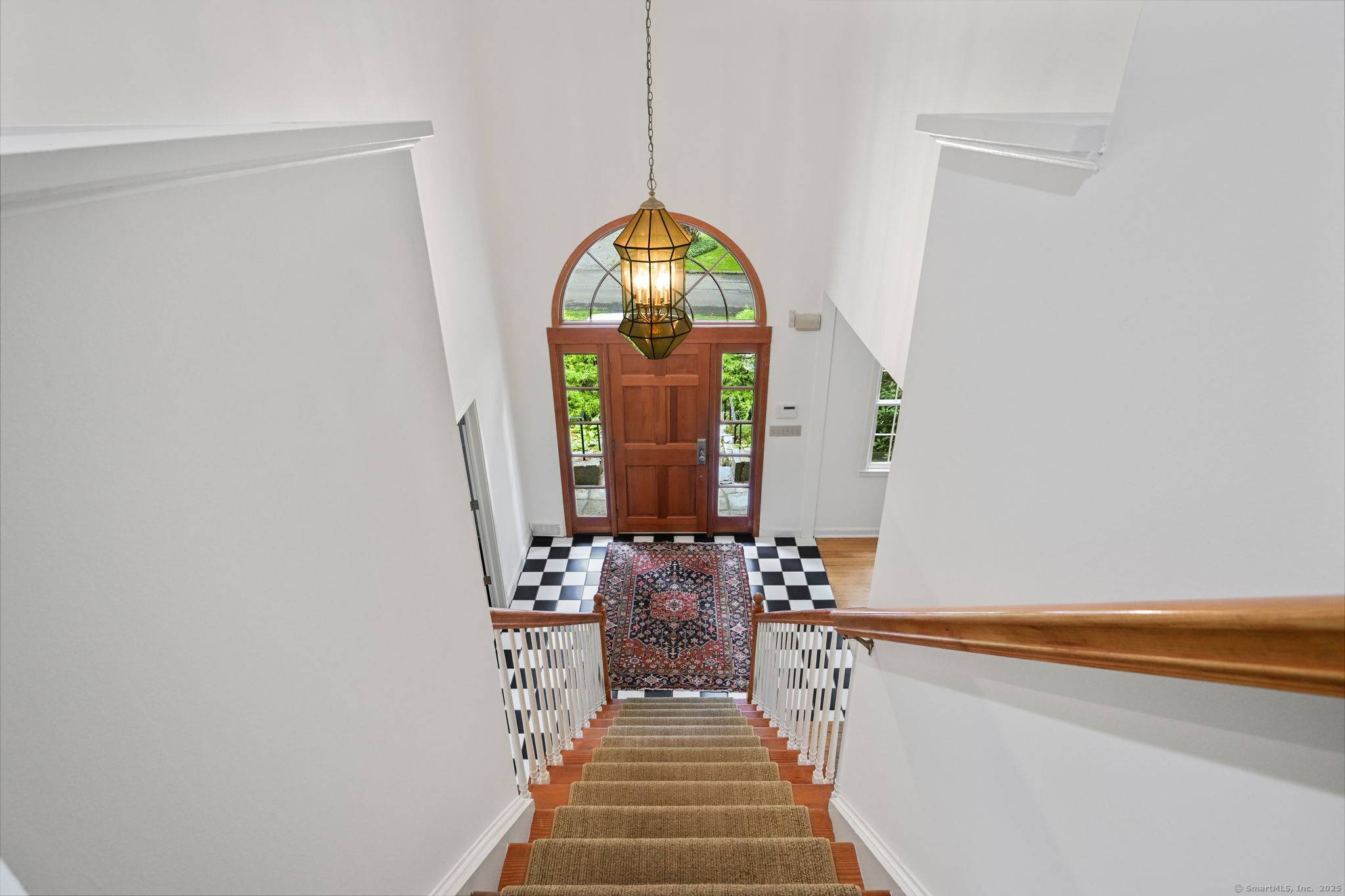 Live your best life at 60 Redmont Road, situated on the North side of Stamford, offering over an acre of land with complete privacy.