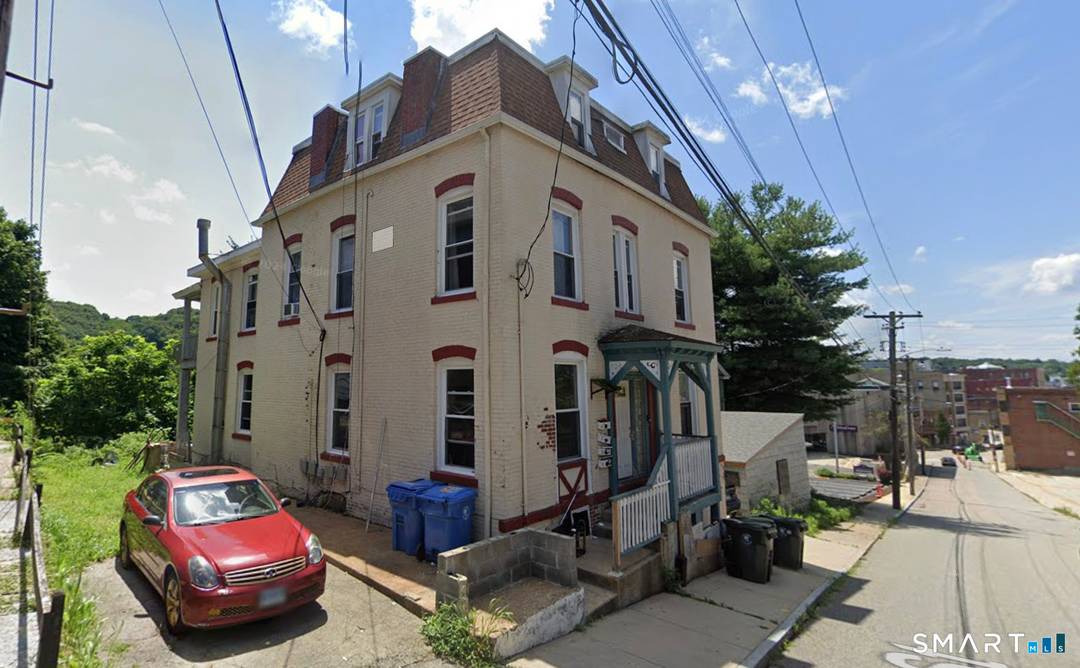 Investors take notice. Fully occupied 4 family property with an in law apartment.