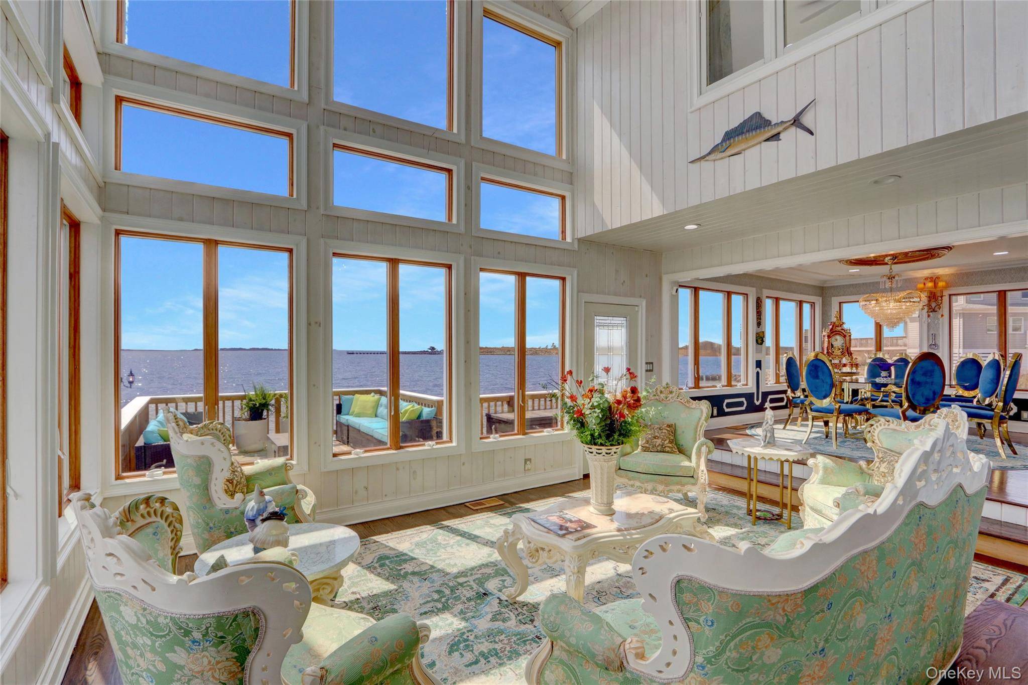 This waterfront stunner brings the vibes and the views !