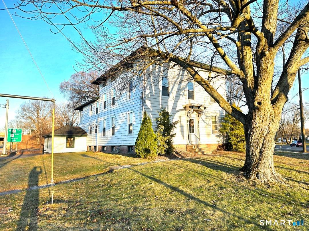 Welcome to 110 Main St, East Hartford, an investment and business opportunity positioned along a high visibility corridor.