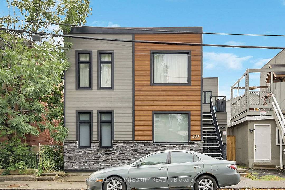 Discover this beautifully renovated legal duplex featuring two expansive apartments, each unit features modern finishes, A C and are ideally located just minutes from downtown.