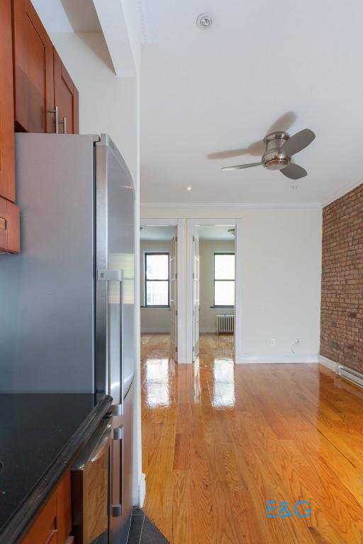 Available for February 1 occupancy, this beautifully renovated 2 bedroom 1 bath apartment with modern updates features an updated kitchen with dishwasher, and an in unit washer and dryer.