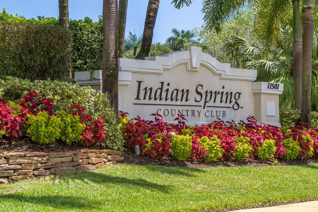 Gorgeously renovated lake view home in Hampton Fairways at Indian Spring where club membership is optional.