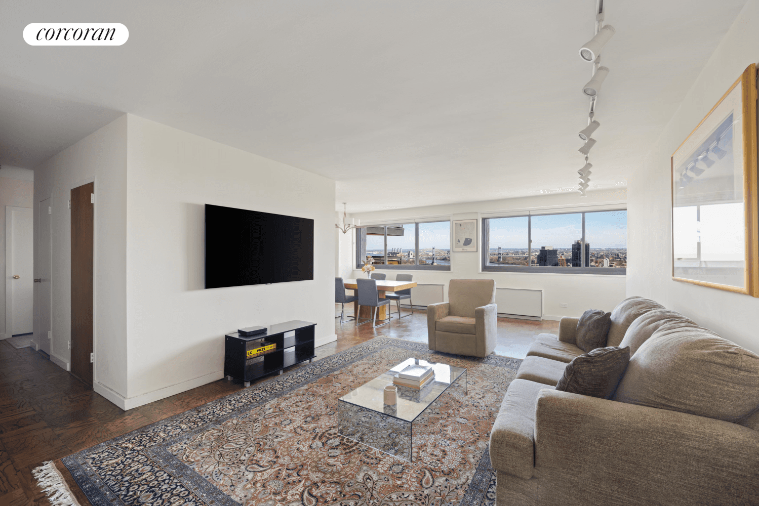 Enjoy sweeping panoramic city, bridge and East River views from this spacious, high floor 2 bedroom, 2 bathroom full service cooperative at 1725 York Avenue.