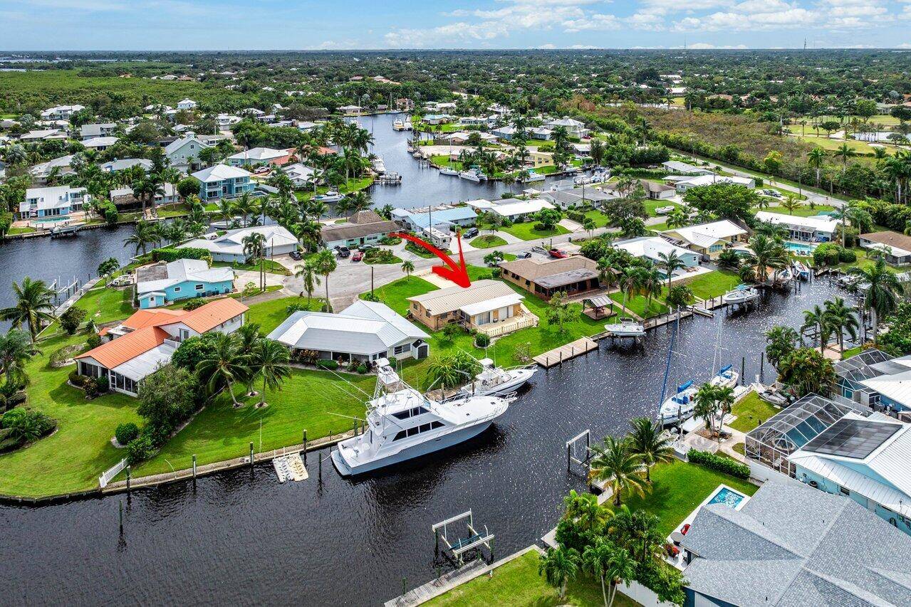 Opportunity Knocks ! ! This 3 bedroom, 2 bath single family home located on a DEEP WATER NO FIXED Bridges waterfront lot !