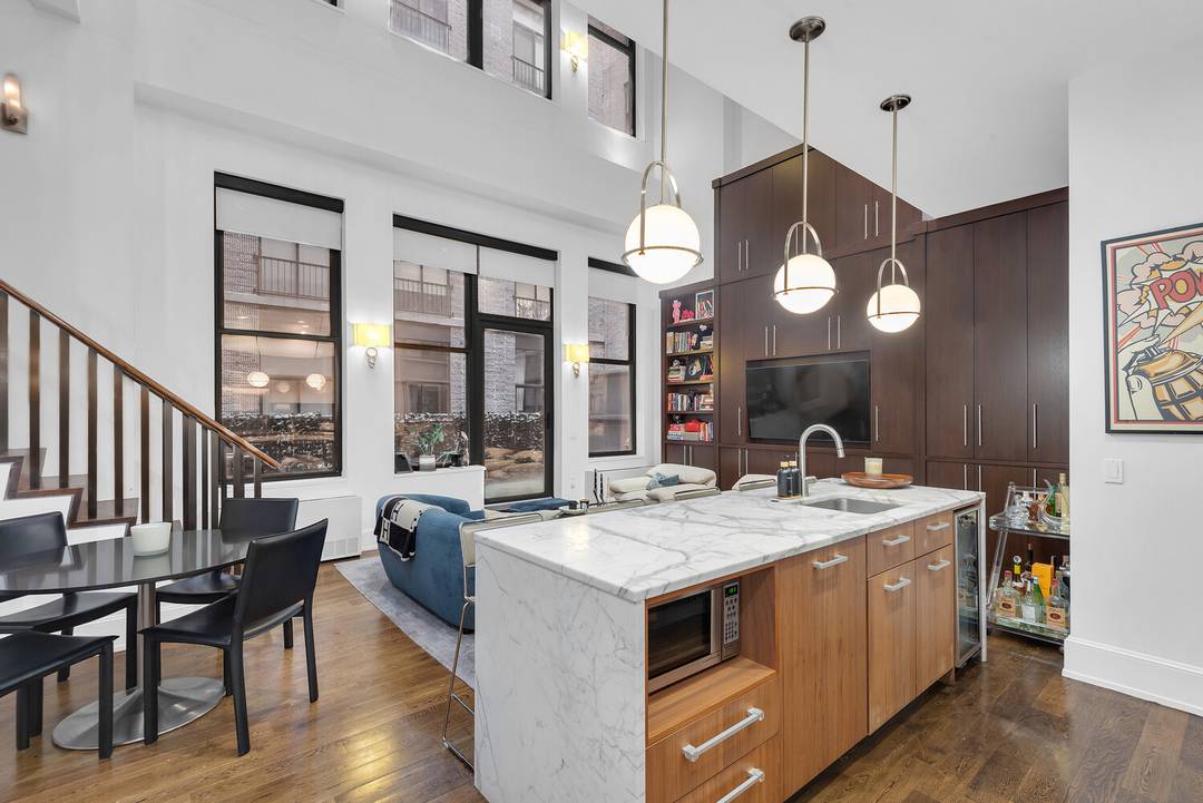 A rare and dramatic duplex loft in one of Flatiron's most sought after full service condominiums.