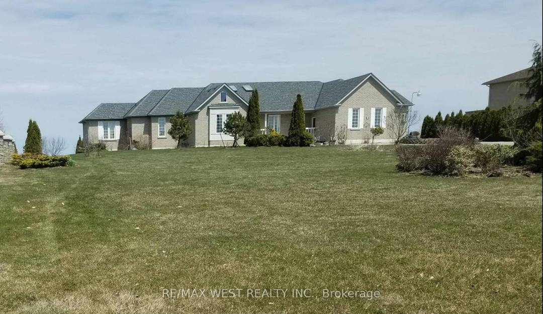 Welcome to 8 Everglade Drive, a rare opportunity to own a stunning executive bungalow nestled on an extraordinary 2 Acre ravine lot in the prestigious Toronto Gore Rural Estate.