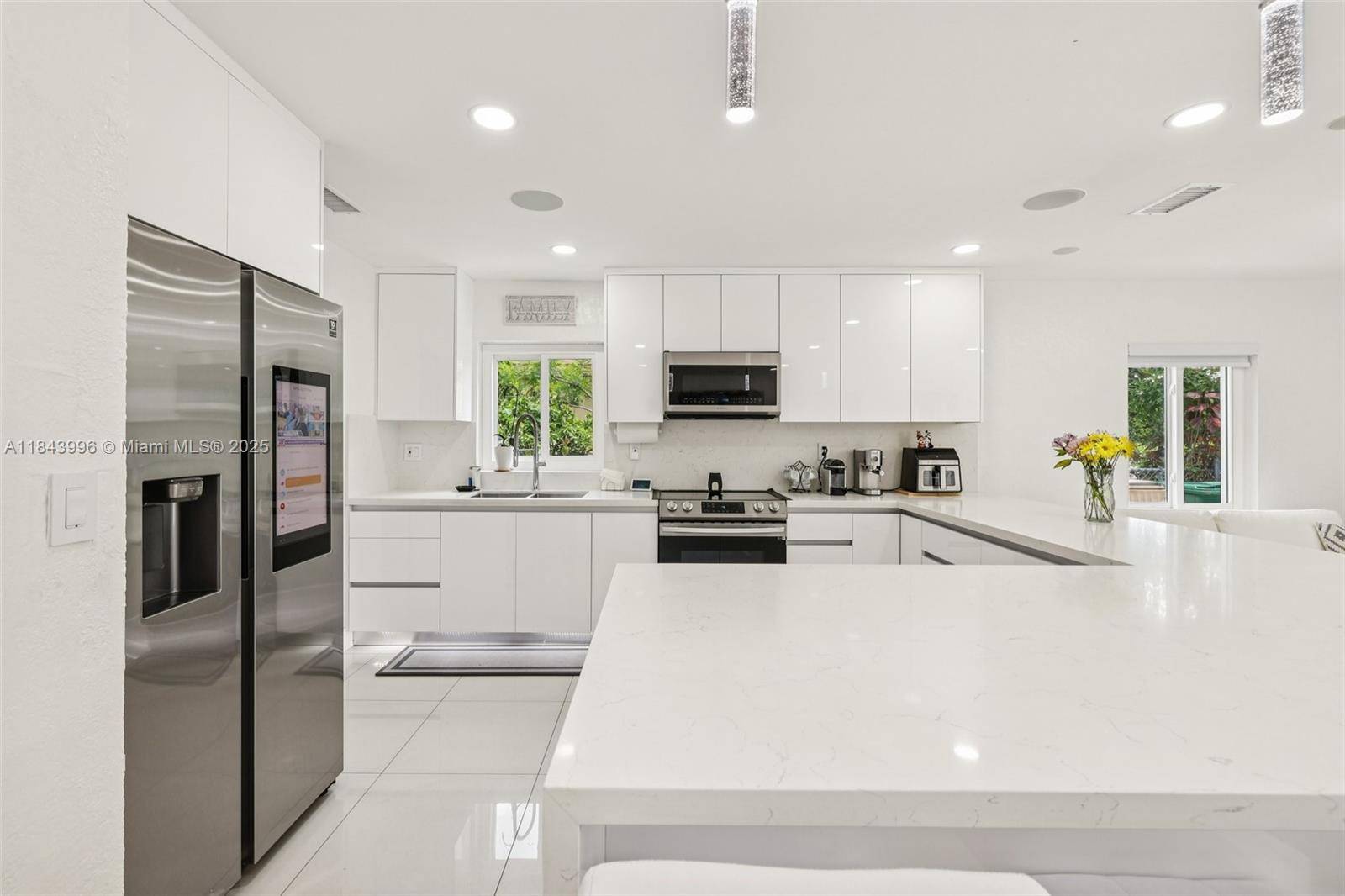 Beautifully Updated 4 Bedroom Home with Private Pool Oasis !