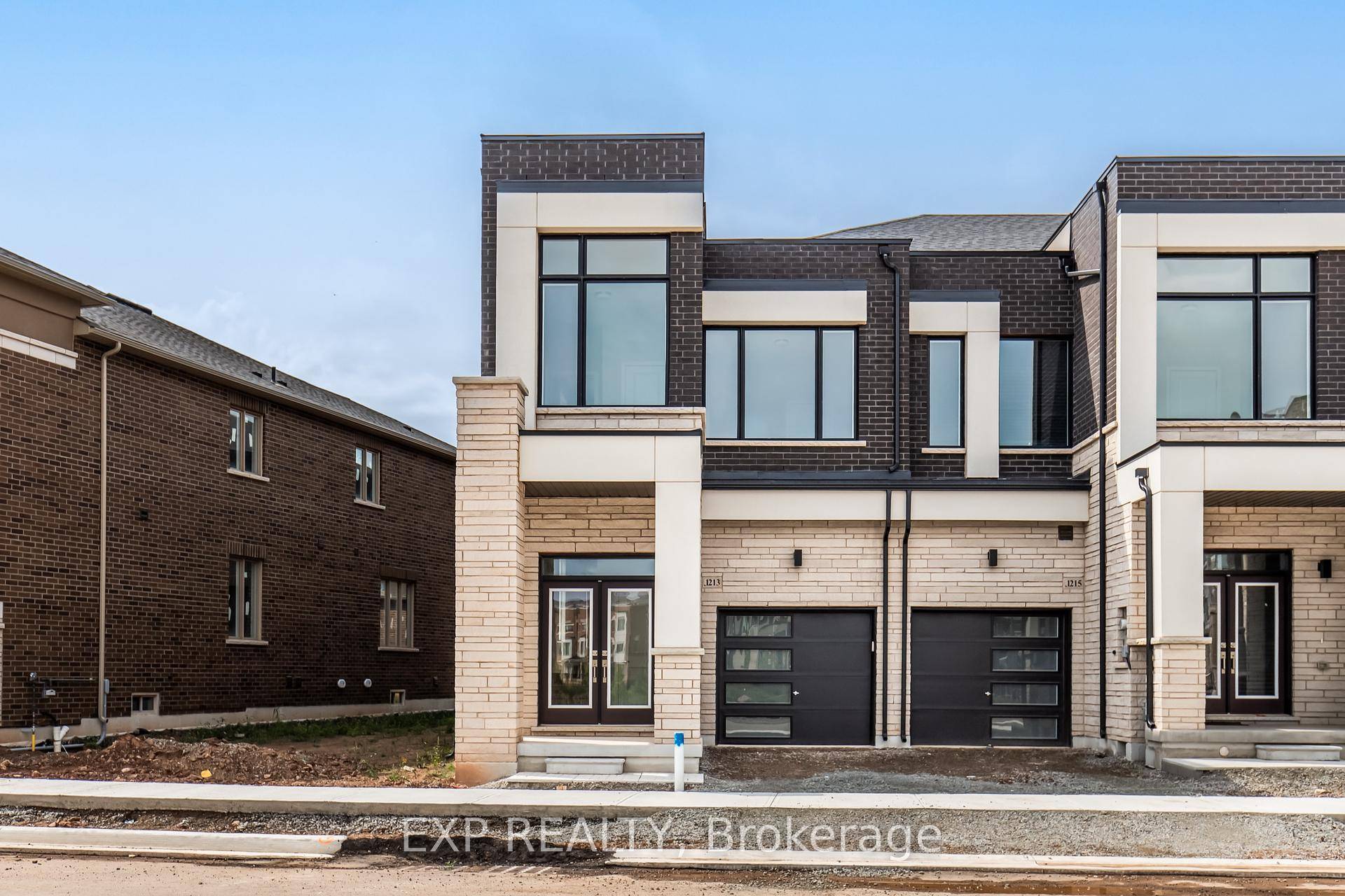Set in Joshua Creek, this elegant townhome offers an open concept main level with dedicated dining and living areas and a fireplace.