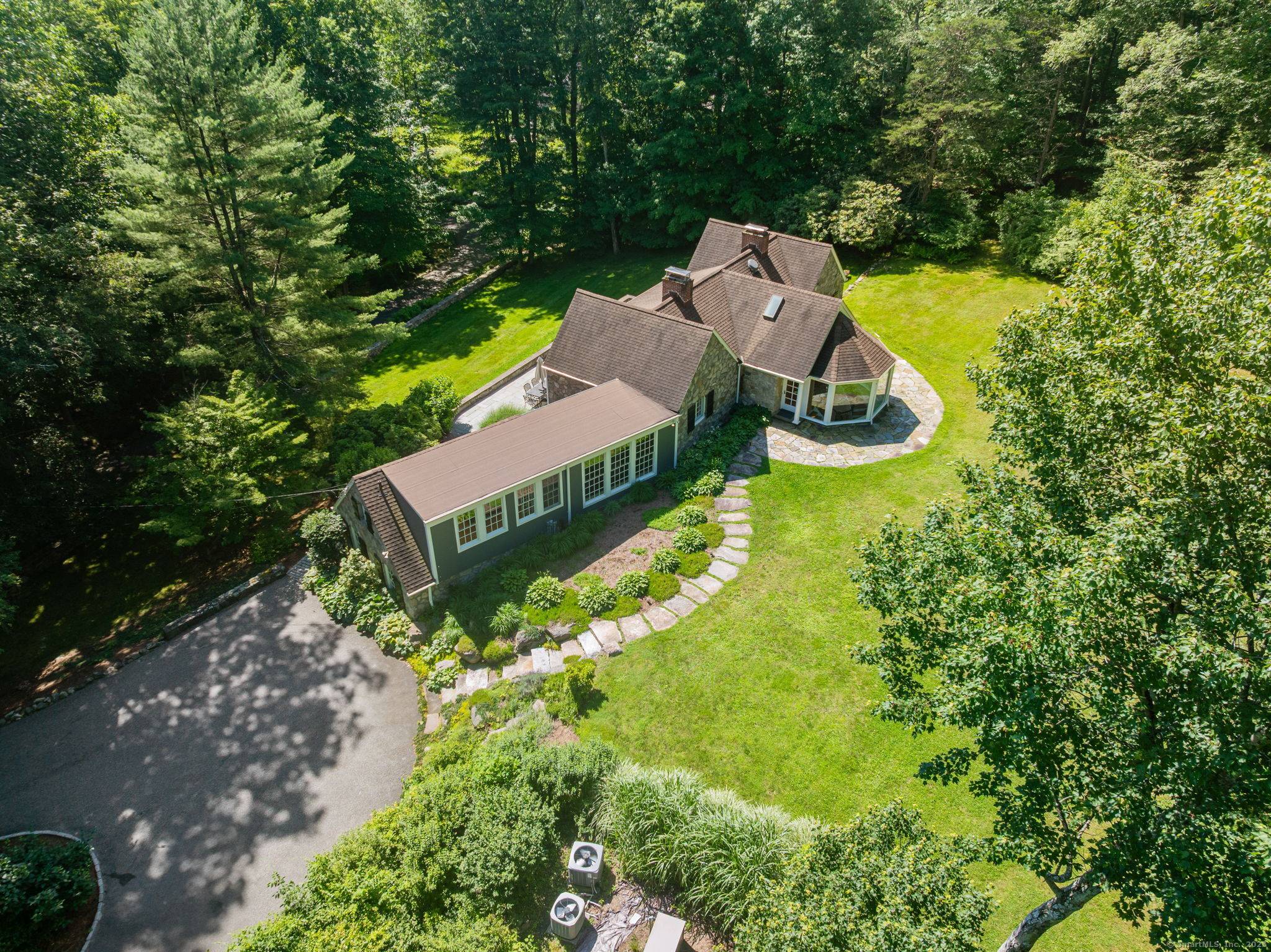 Sculpted from the Earth, Steeped in History This 1931 Frazier Forman Peters masterpiece is a true work of art hand cut fieldstone seamlessly embedded into its hillside perch, embodying strength, ...