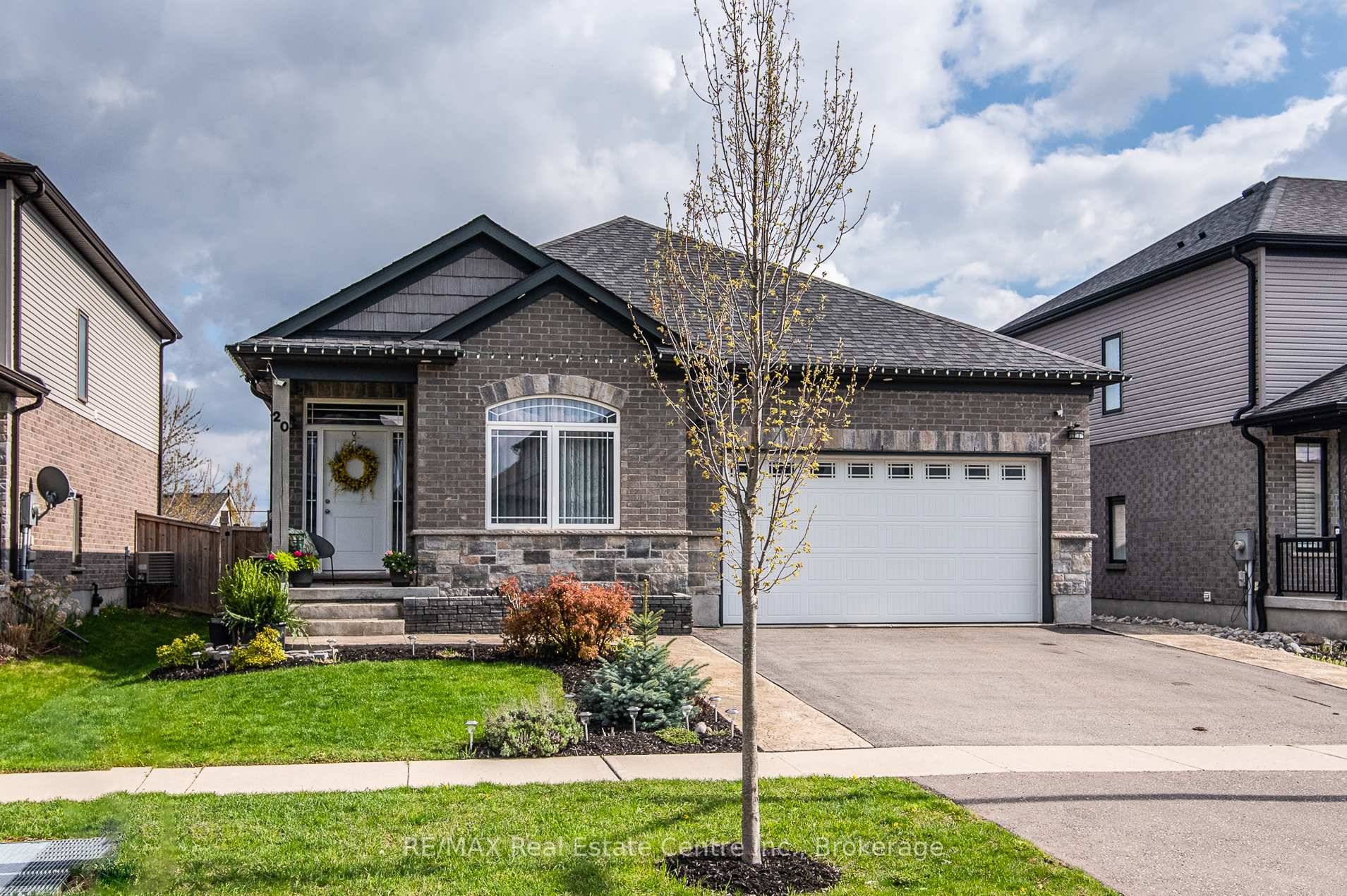Located in one of New Hamburg's most sought after neighbourhoods, this stunning 8 year old bungalow offers an exceptional blend of modern luxury and timeless style.