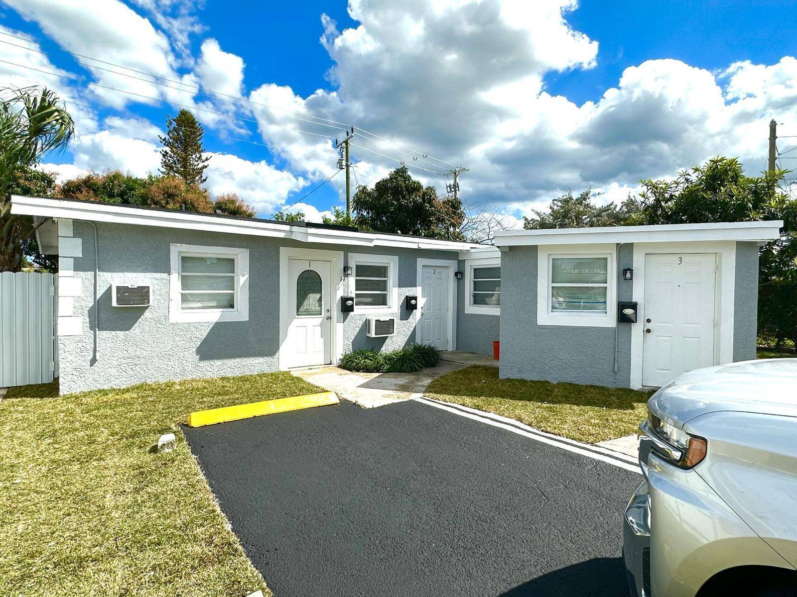 Discover a fantastic investment opportunity with this well maintained triplex located in the heart of Pompano Beach.