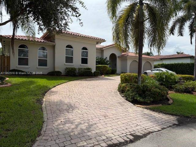 Beautiful four bedroom, four bath split plan home located in the highly sought after Palmetto Bay area.