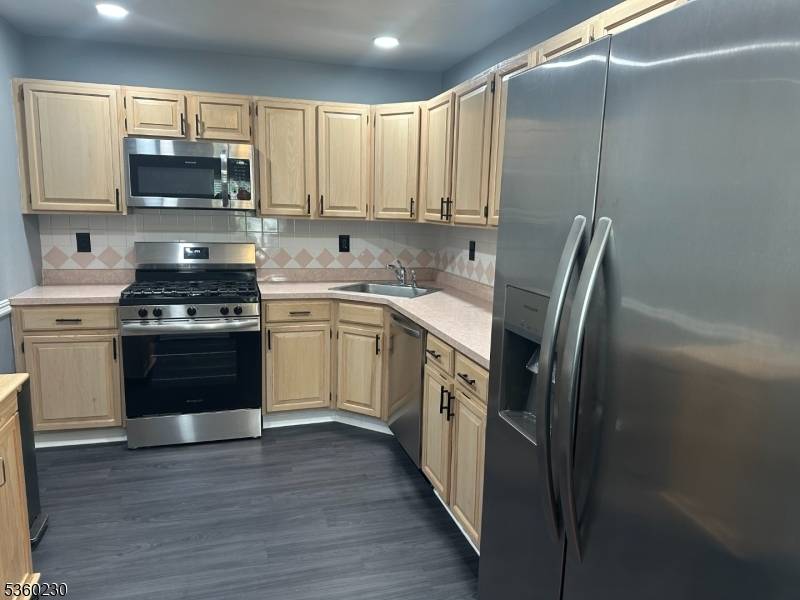 Beautiful, Remodeled Townhouse, Newer Bathrooms, Laminated Floors, Stainless Steel Appliances, Recessed Lights, Centrally Located, NYC Buses Across from Development, NJ Transit Trains about 5 Min Away, Near Shopping Centers and ...