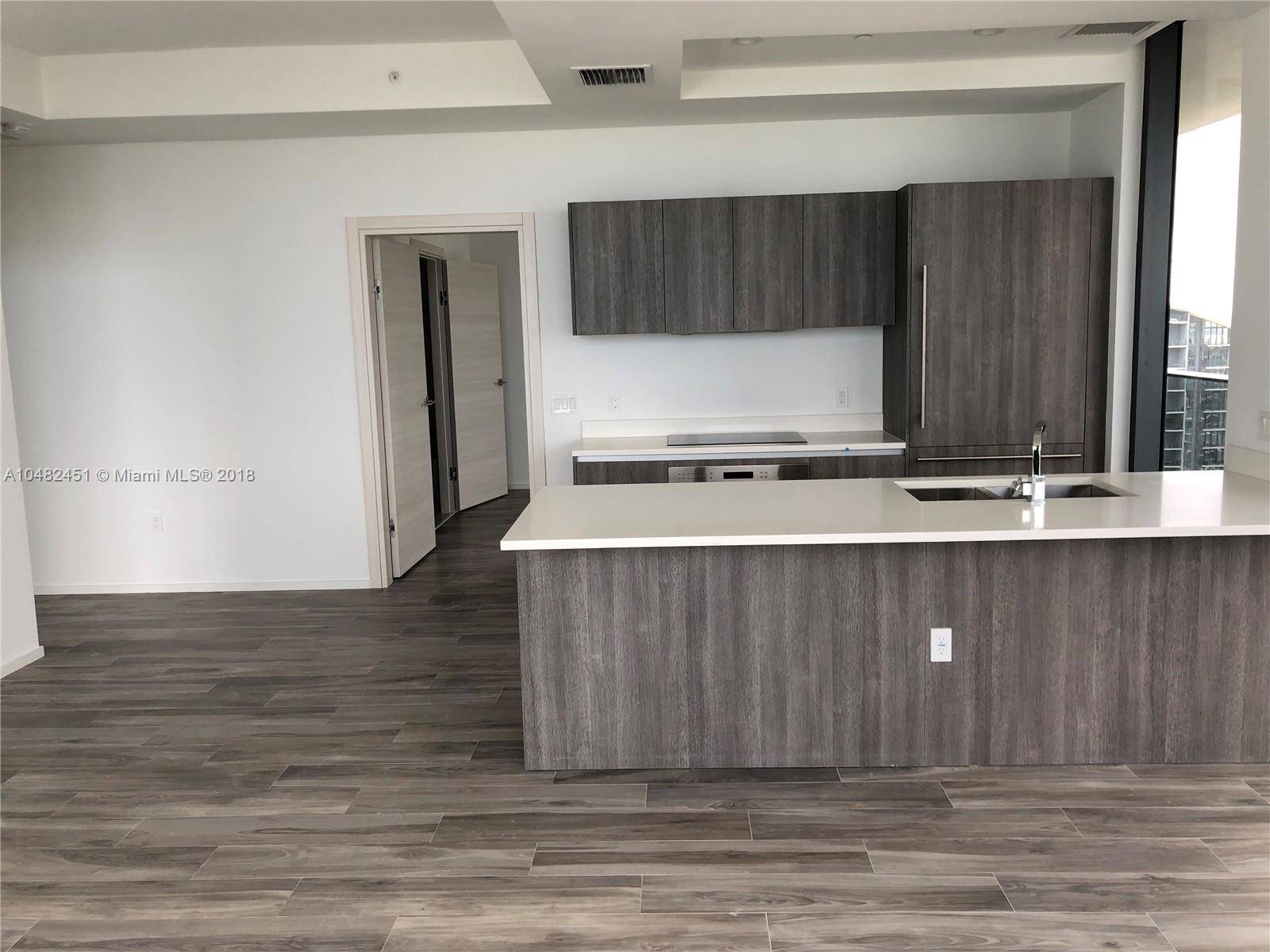 Brand new high floor 2Bed 2Bath corner unit with wrapped around balcony facing bay and Miami skyline.