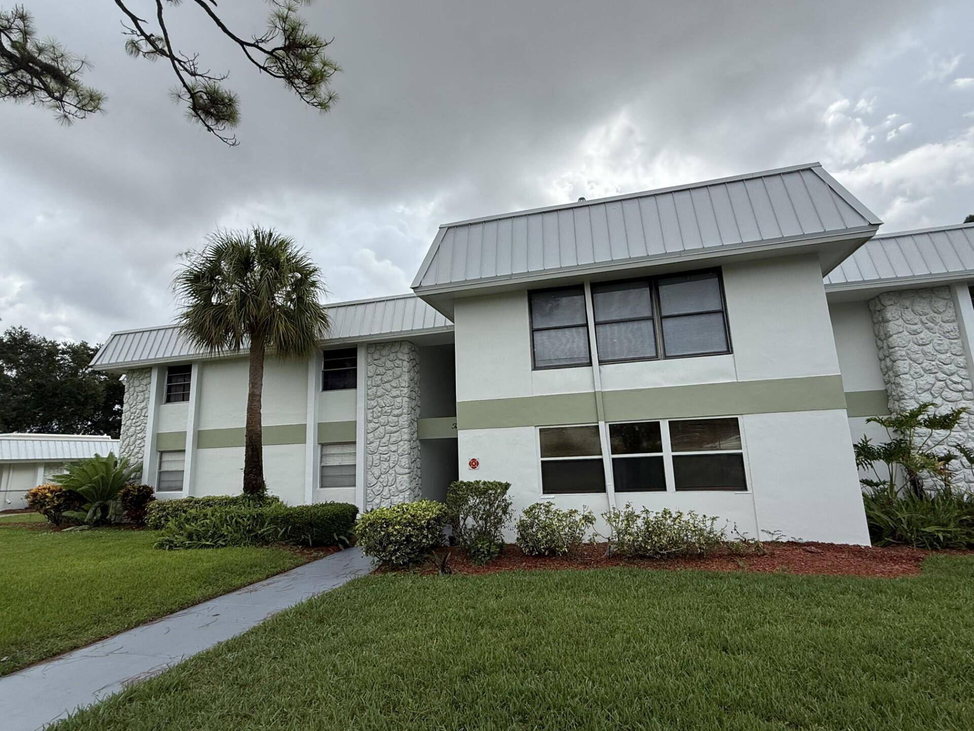 Fully renovated and move in ready, this 2 bedroom, 1 bath condo is tucked inside the highly sought after 55 The unit features all new flooring, modern lighting and ceiling ...