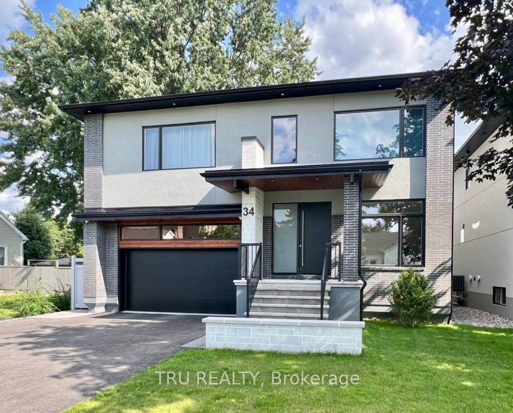 Open House Sunday, June 1'st from 2 4PM Executive custom home WITH SUPERIOR ICF INSULATION is nestled in the heart of St Claire Gardens.
