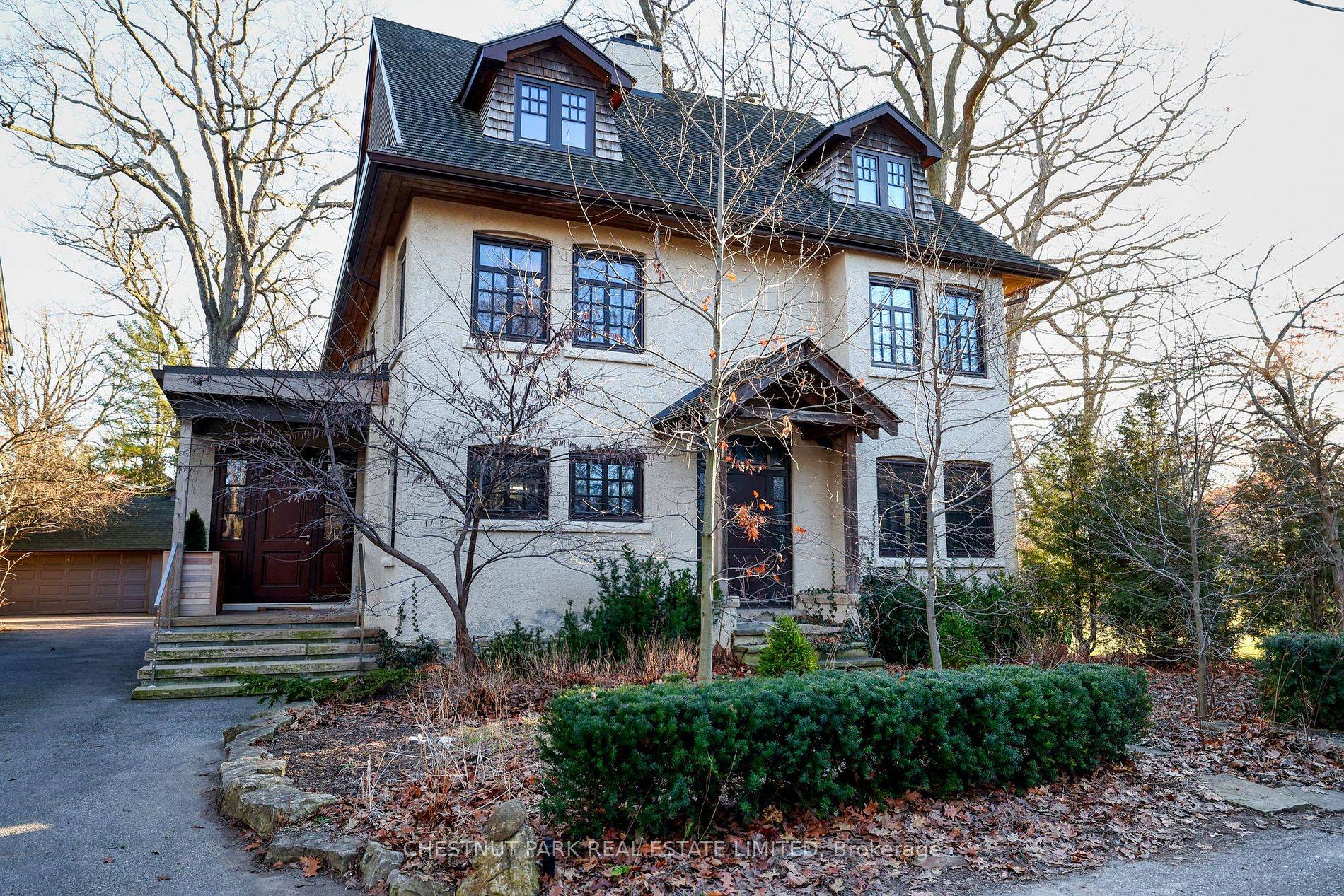 This meticulously designed and impeccably built custom home is constructed within the wrappings of a traditional Wychwood Park home.