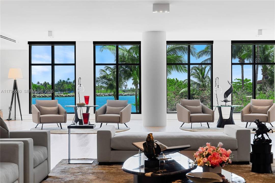 LUXURY IN MINIMALISM DESIGNED IN ELEGANT HUES OF GRAY amp ; TAUPES IN THIS PALATIAL CORNER RESIDENCE WITH BAY VIEWS ON FISHER ISLAND S PALAZZO DEL SOL !