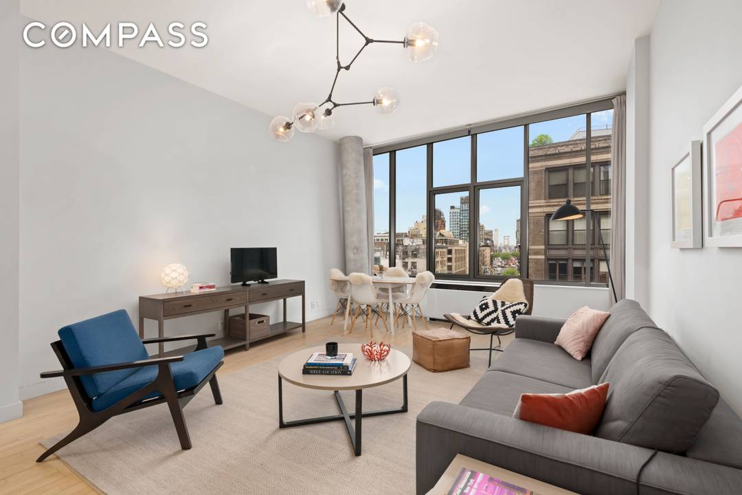 Start each day watching the sun rise over the Williamsburg Bridge from your spacious living room.