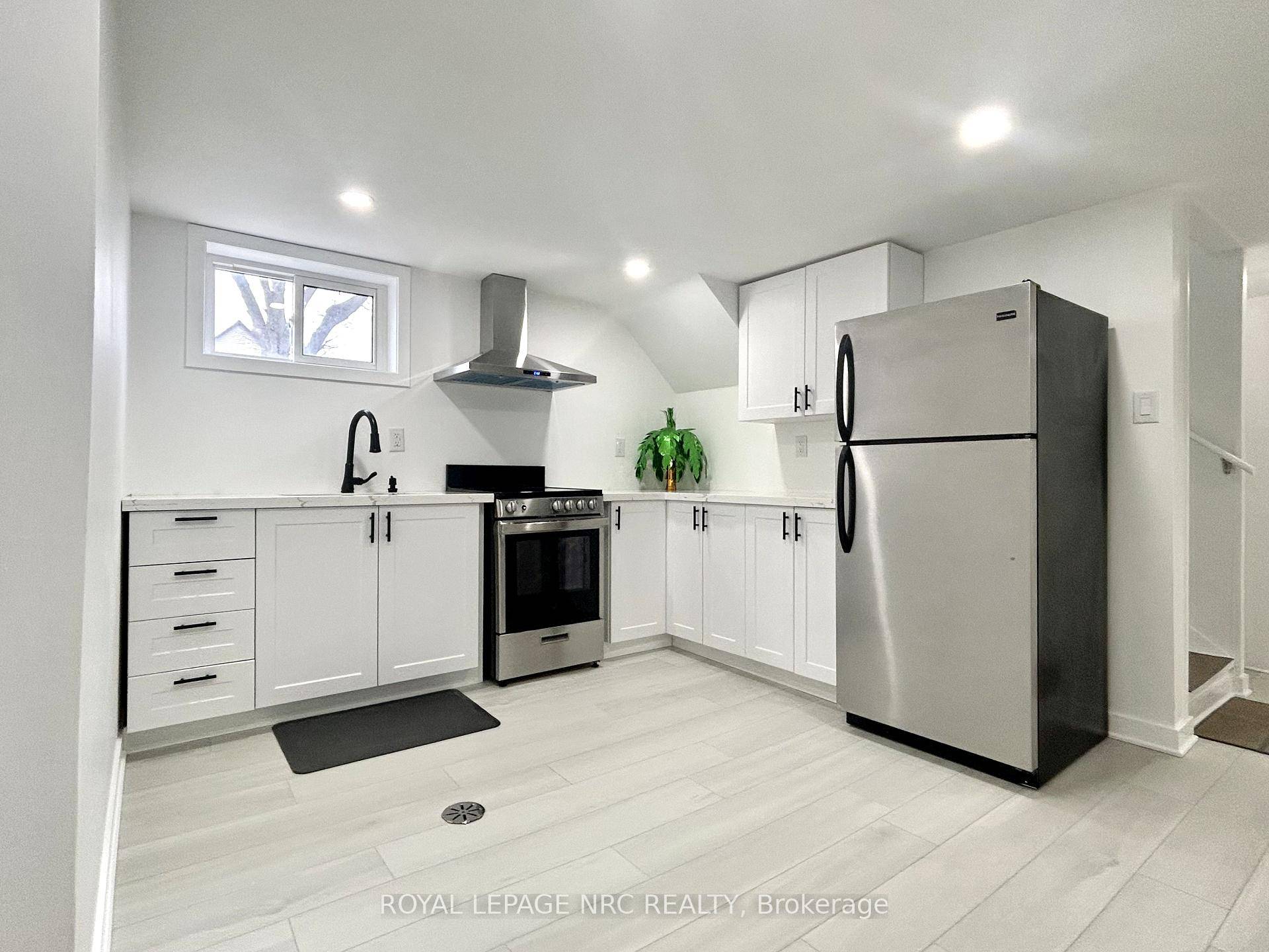 Welcome to this beautifully finished lower level apartment, ideally situated on a corner lot in the highly desirable south end of Niagara Falls.
