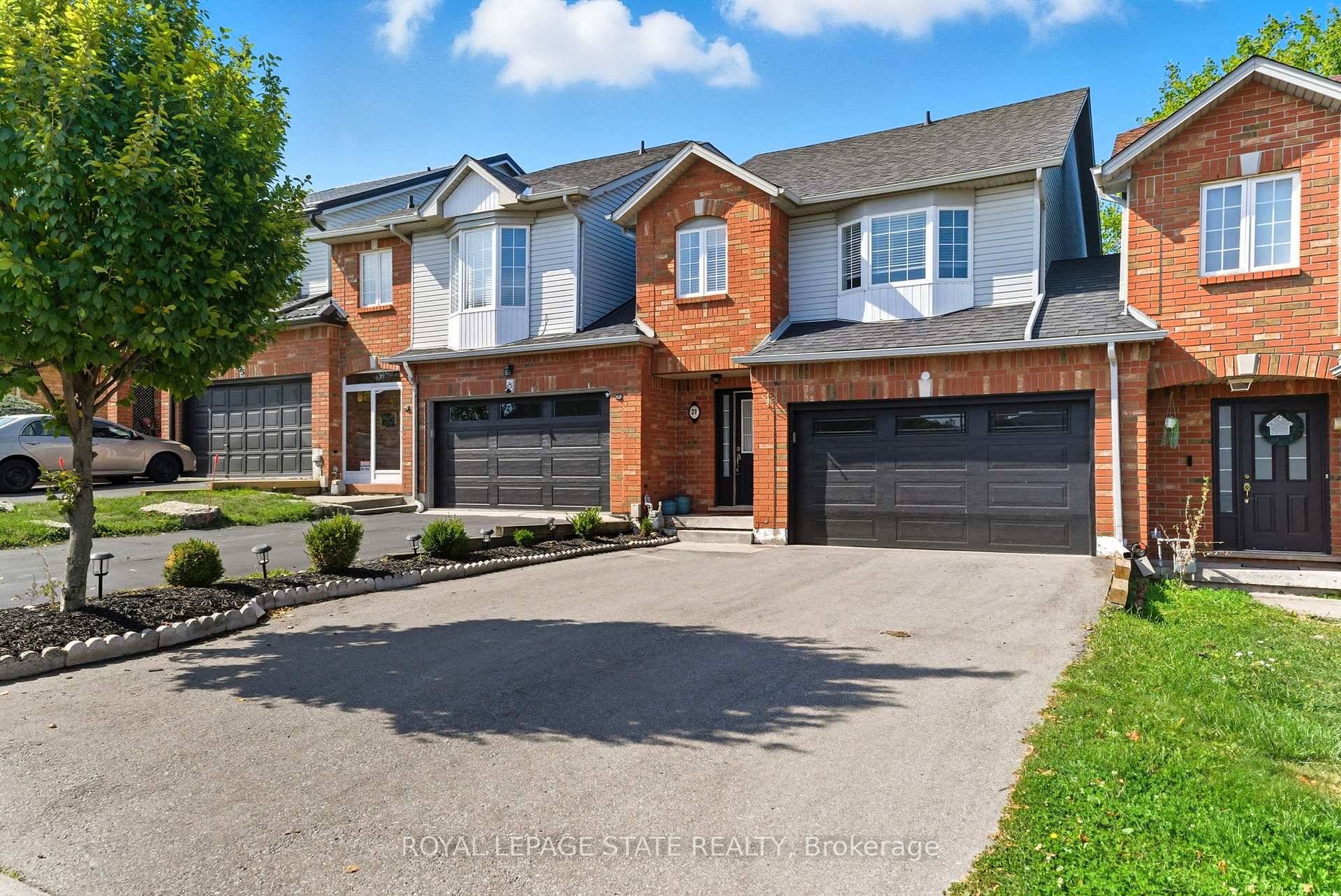 Spacious freehold townhouse backing onto Treed Ravine lot.