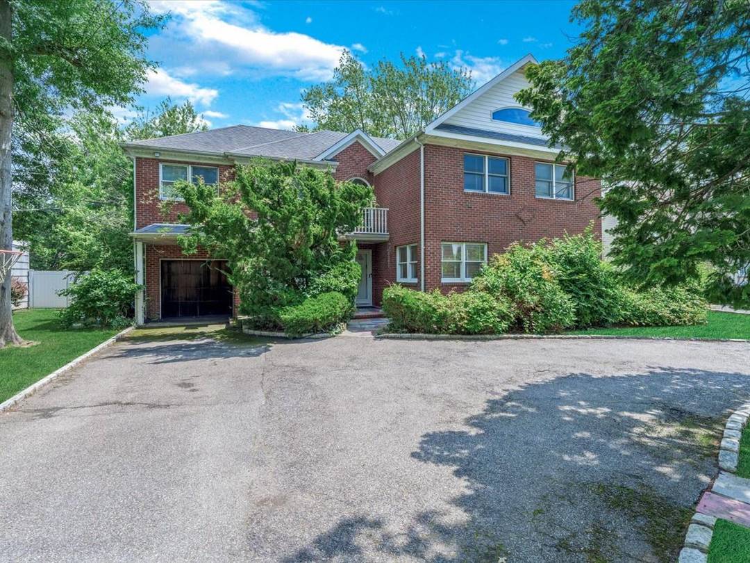 On one the best blocks in Lawrence, this house is in a great location has over 4.