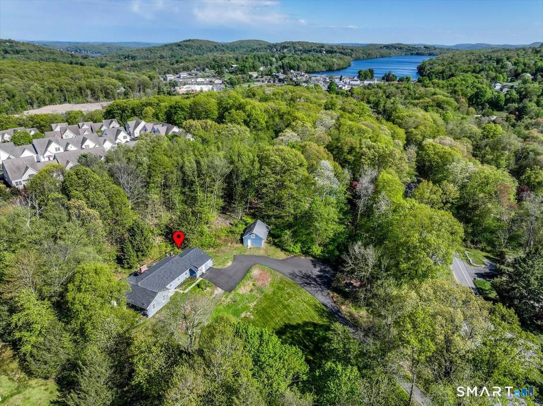 Beautifully updated and thoughtfully designed, this spacious home offers exceptional flexibility and privacy on a serene 2.