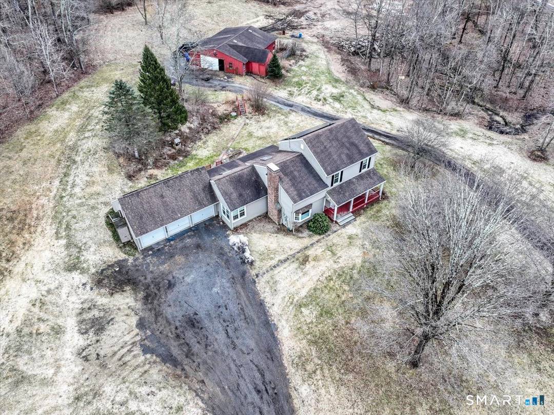 Welcome to 55 Litchfield Turnpike a charming farmhouse colonial set on 7.