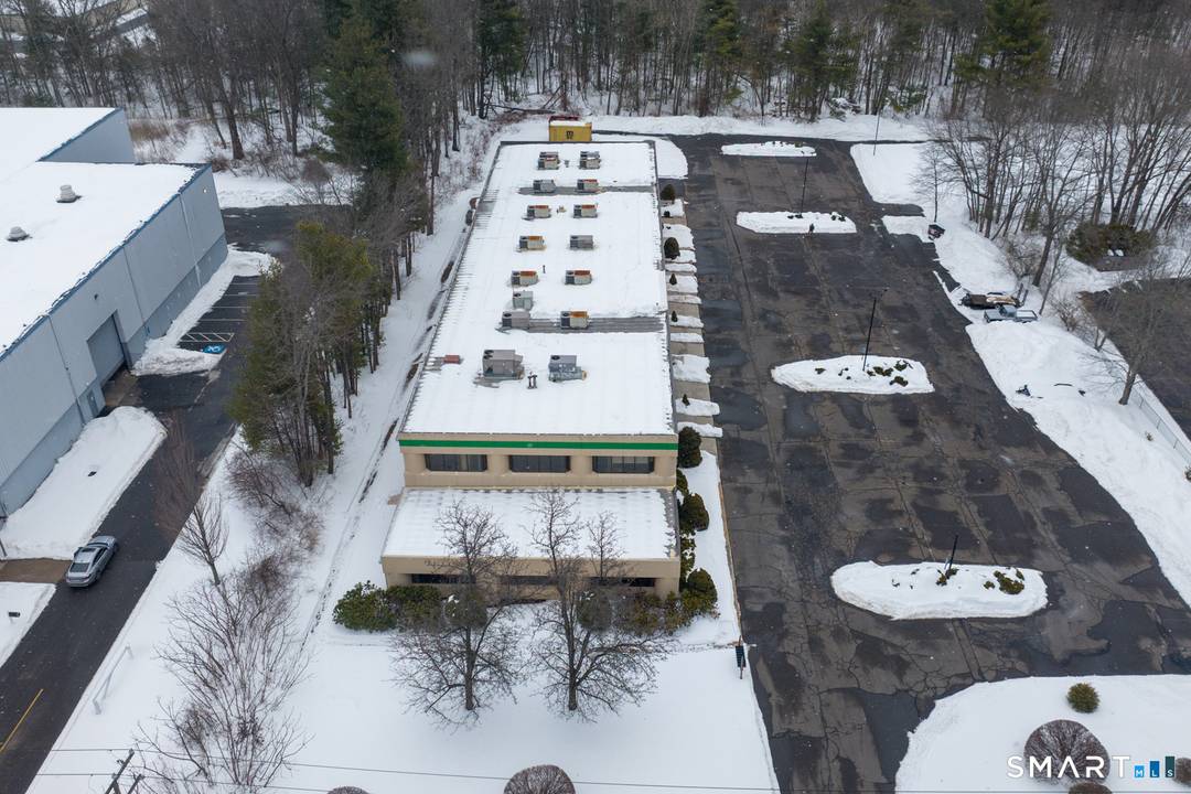 This is one unit in Phelps Place Condominium Association, an attractive 8 unit property in a business area with good access to I 91.