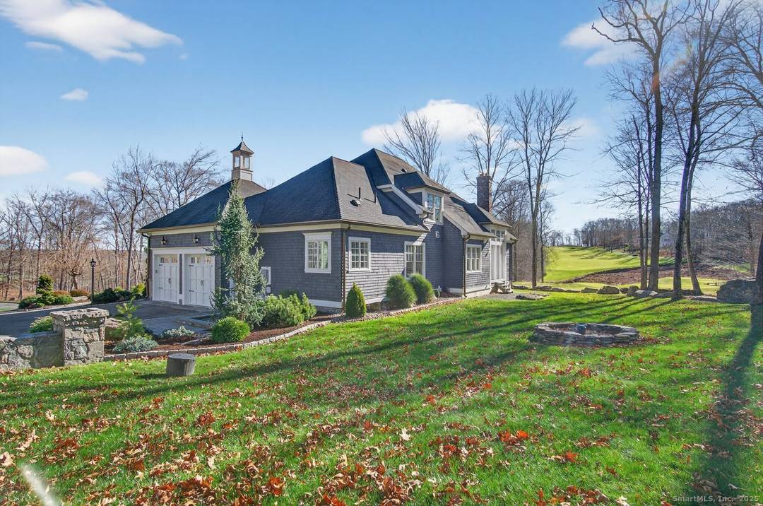 Sited on a manicured landscaped lot overlooking golf course fairways, this elegant home features an open floor plan and streaming natural light.